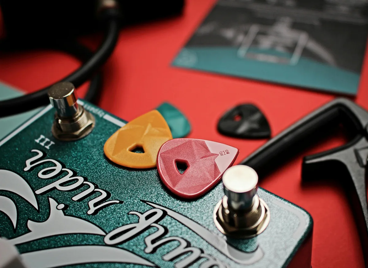 Guitar picks on an effects pedal